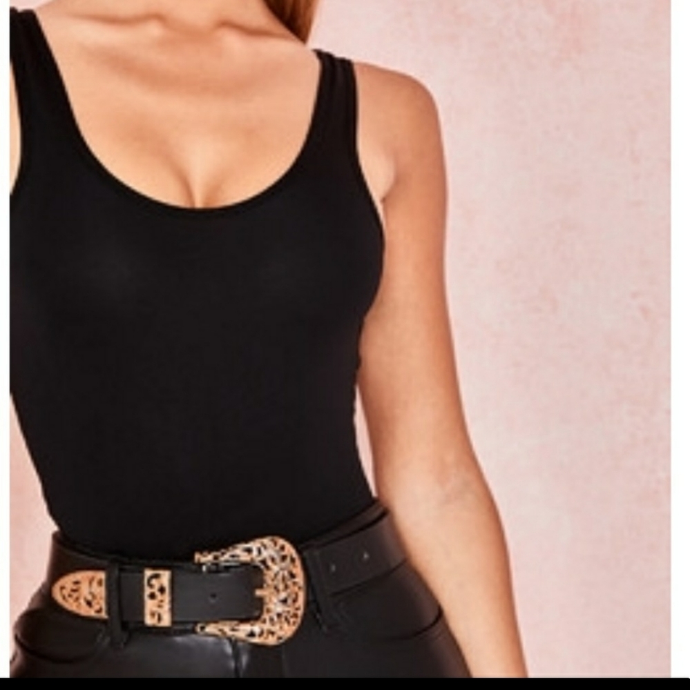 Rancher black and gold buckle belt.
